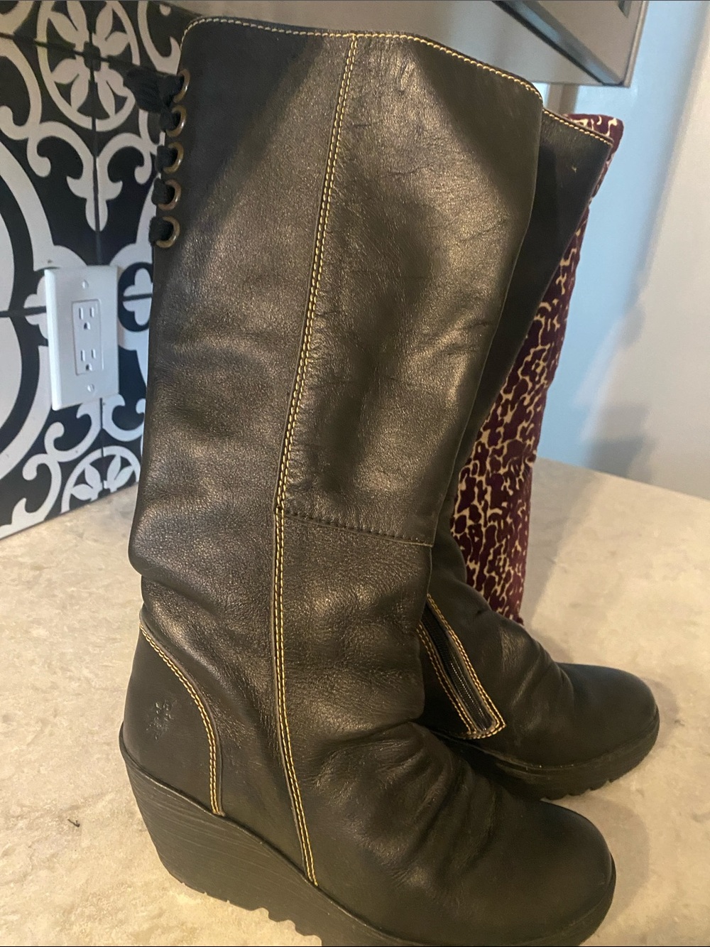 Fly London  Wedge tall platform boot